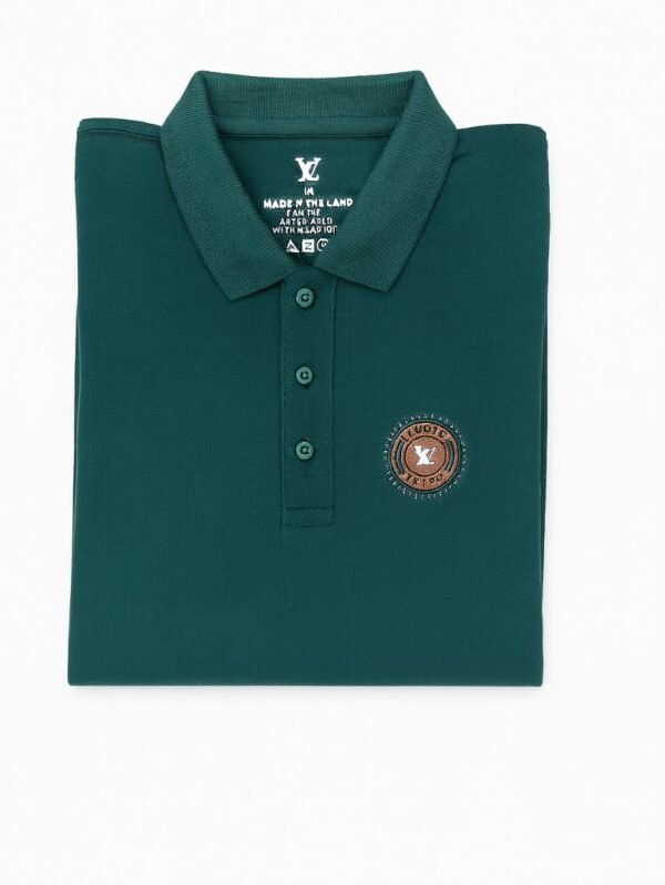 Green short-sleeve polo shirt with embroidered logo patch on the chest, featuring a three-button placket and ribbed collar.